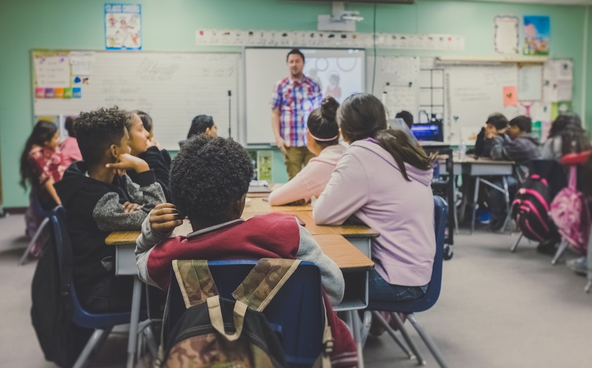Teacher with young students
